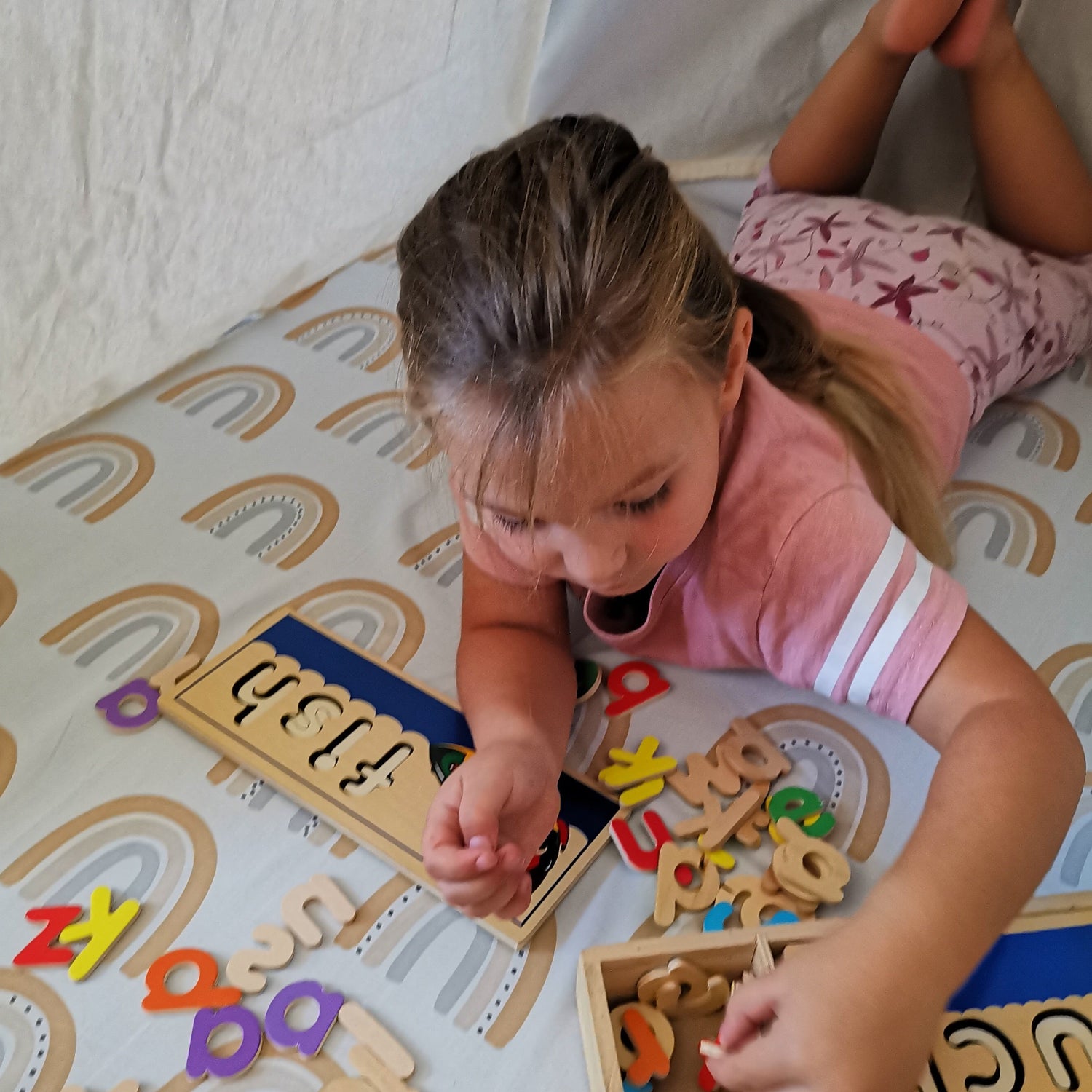 Toddler playing on kids mat