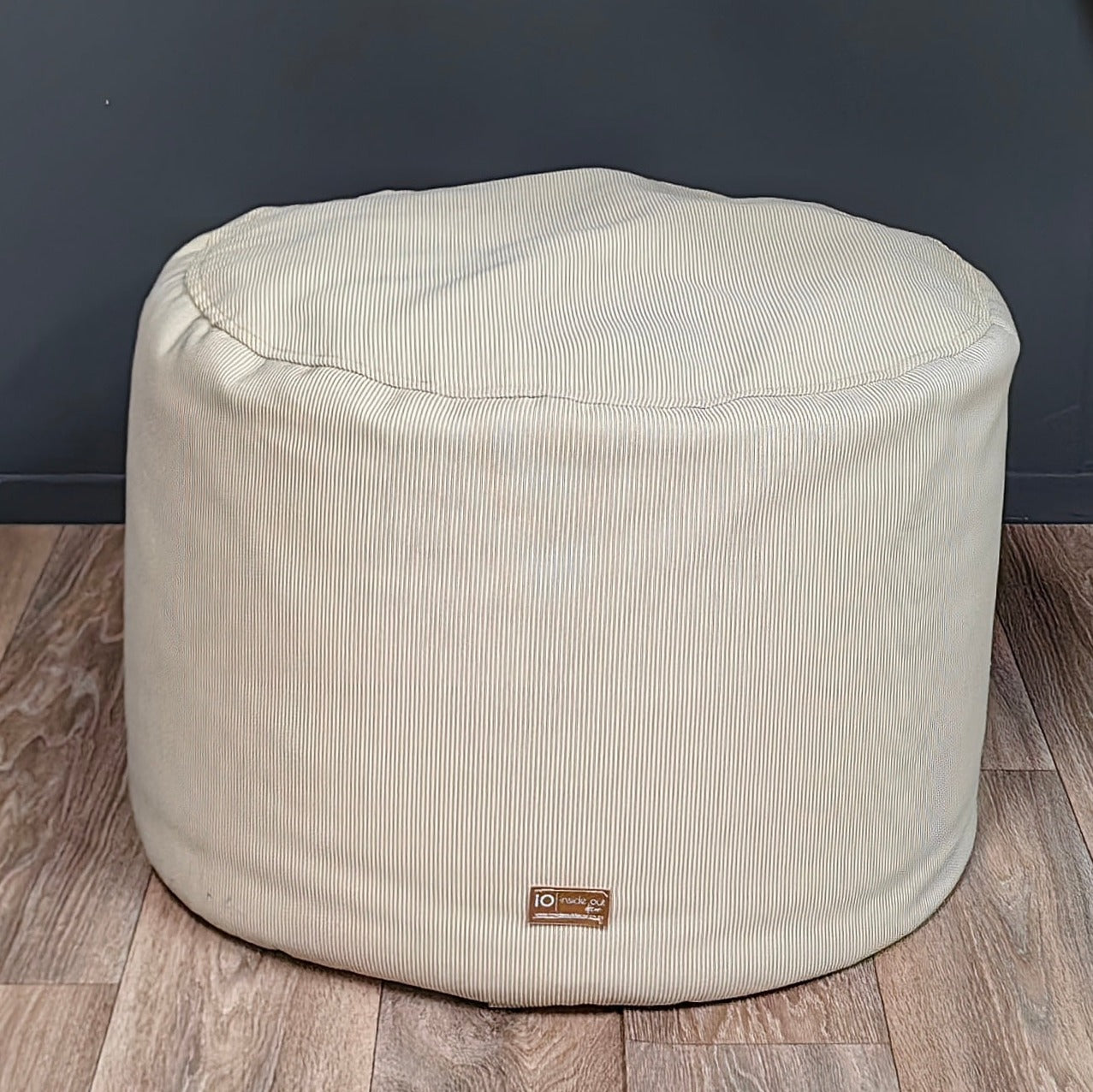 beige round ottoman